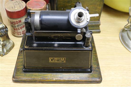 An Edison Gem phonograph with horn and seven cylinders